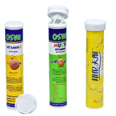 Botellas de pastillas efervescentes de vitamina en plástico blanco con tapa en espiral y desecante